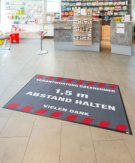 Hinweis-Fußmatte 1,5 Meter Abstand halten