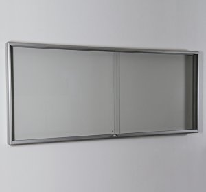formschöner Innenbereich-Wandschaukasten geringer Bautiefe 35 mm abschließbaren Sicherheitsglas-Schiebetüren und magnetischer Metallrückwand